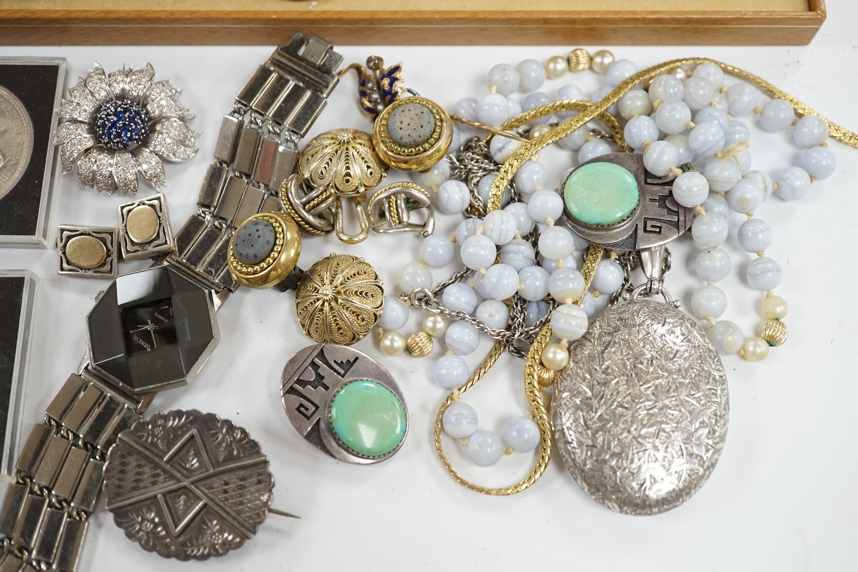 Sundry jewellery and watches, including a late Victorian silver oval locket, an agate bead necklace, Gucci watch silver brooch, enamel diamond and seed pearl set pin, etc. Condition - poor to fair